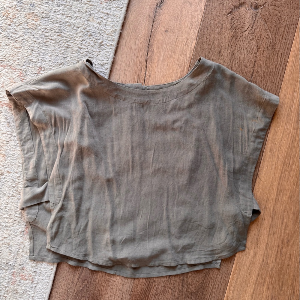 Green crop top with open sides and button back